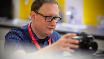 Paul Dodd operating a digital camera