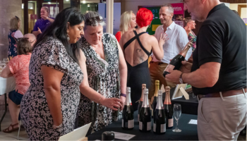 People browsing the wines on offer